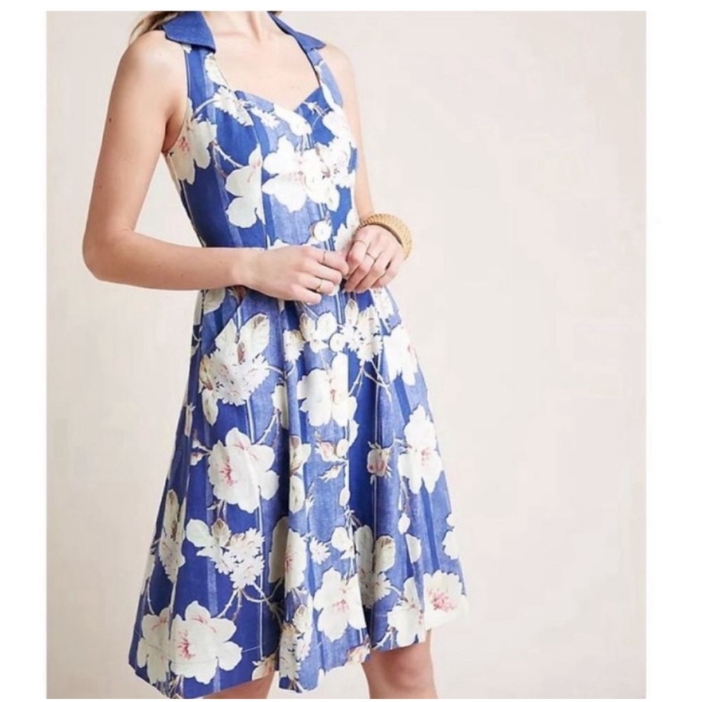 Anthropology button up dress with pockets.